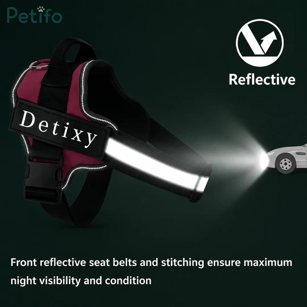 Burgundy dog harness highlighting front reflective stitching and straps for nighttime safety.