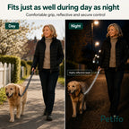 A woman walking her golden retriever on a sunny path using a comfortable, reflective dog leash.