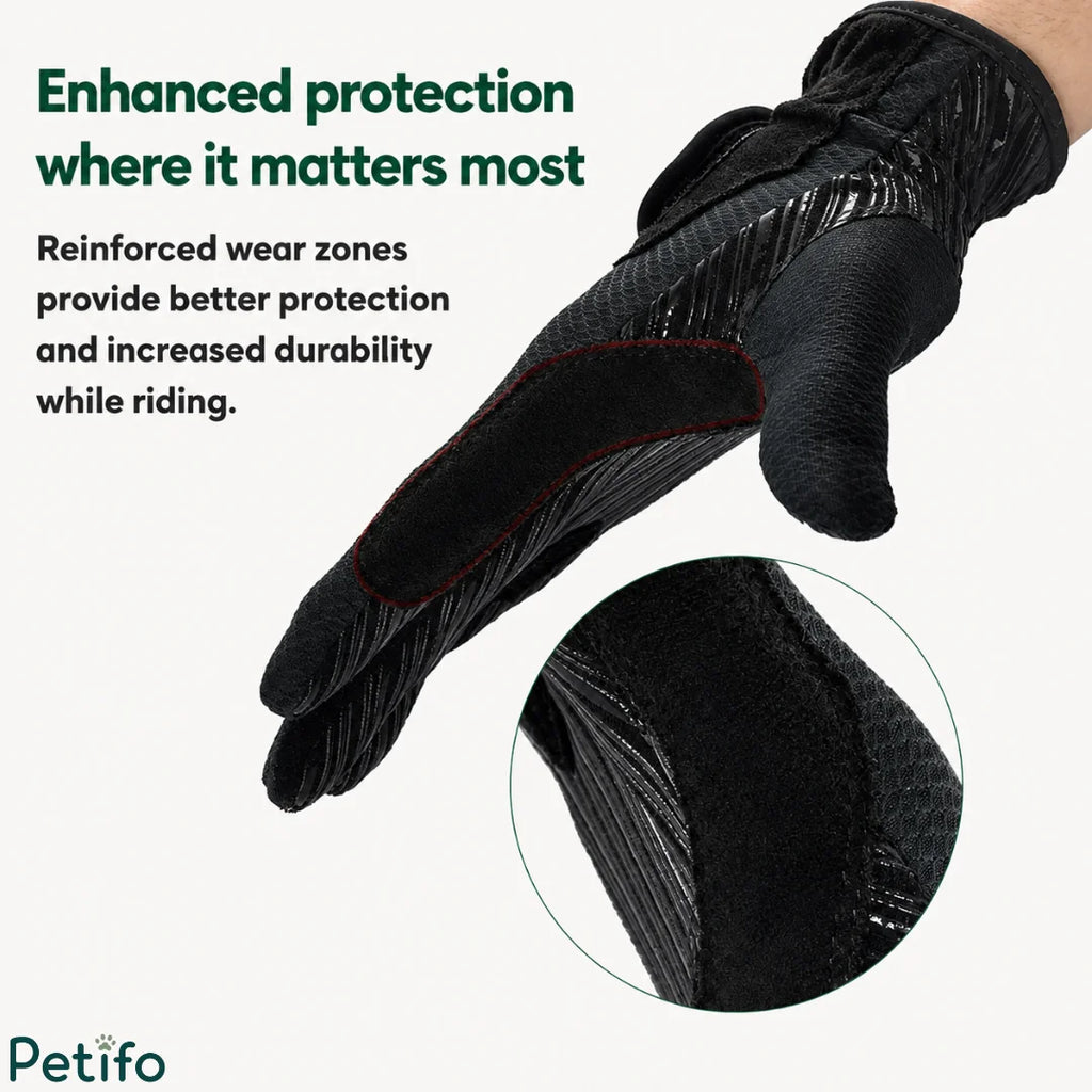 Reinforced wear zones on the fingers and thumb of a black equestrian riding glove for enhanced durability.
