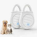 Two white ultrasonic tick repellent devices displayed next to a golden retriever and a cat.