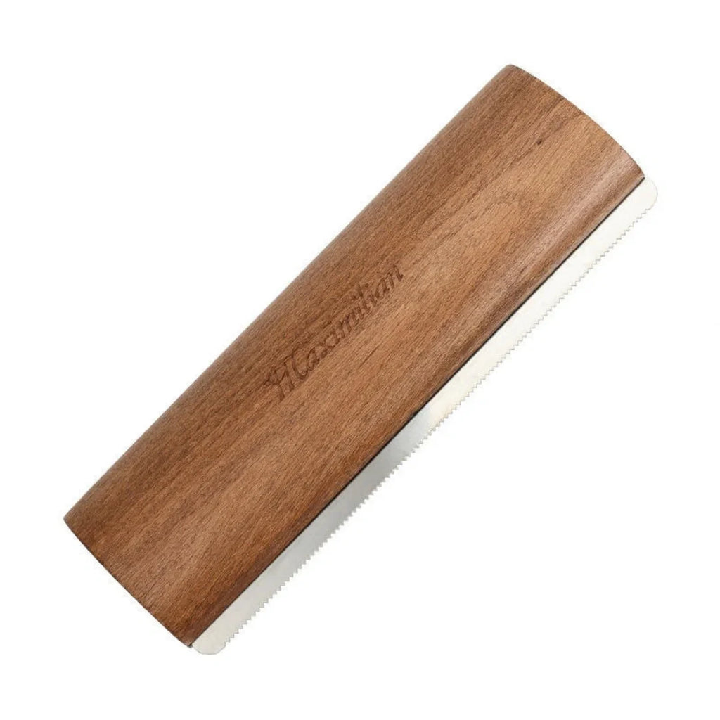 Wooden-handled shedding blade with a serrated metal edge isolated on a white background.