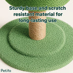 Close-up view of the sturdy green textured base and sisal-wrapped scratching post for long-lasting durability.