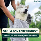 Gentle and skin-friendly microfiber towel being used to dry a white husky outdoors.