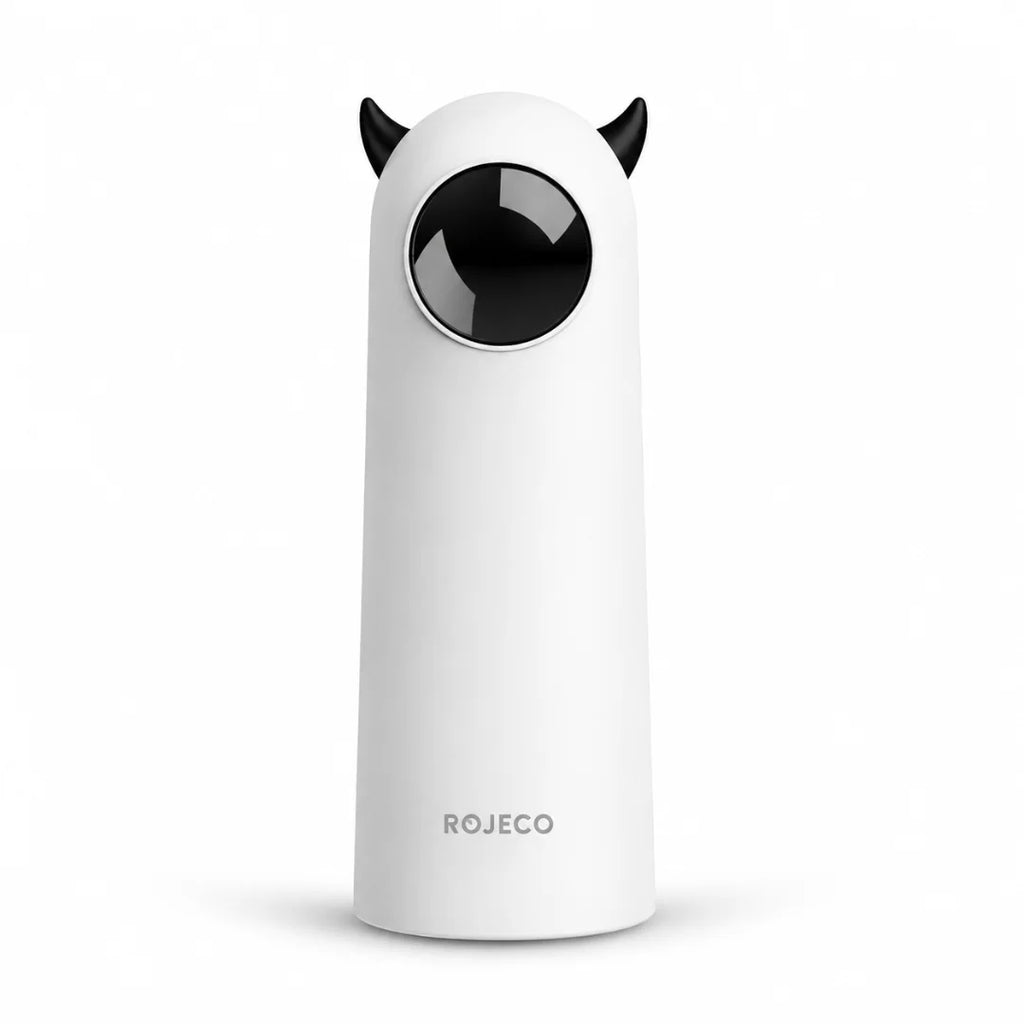 Studio product shot of the white Rojeco automatic laser cat toy with playful black devil horns and a front projection lens.