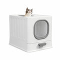 A studio shot of a white top-entry cat litter box with a gray front door and a pull-out cleaning drawer.