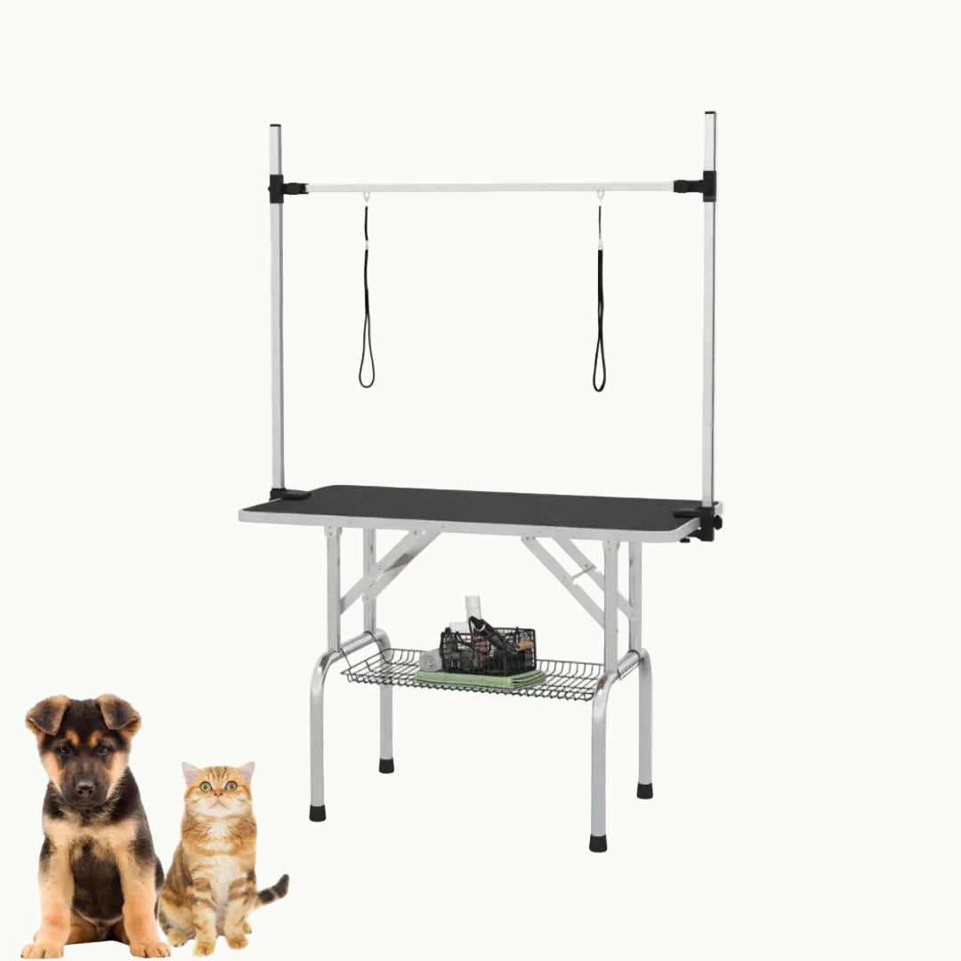 Sturdy foldable pet grooming table with a non-slip surface and accessory storage shelf.