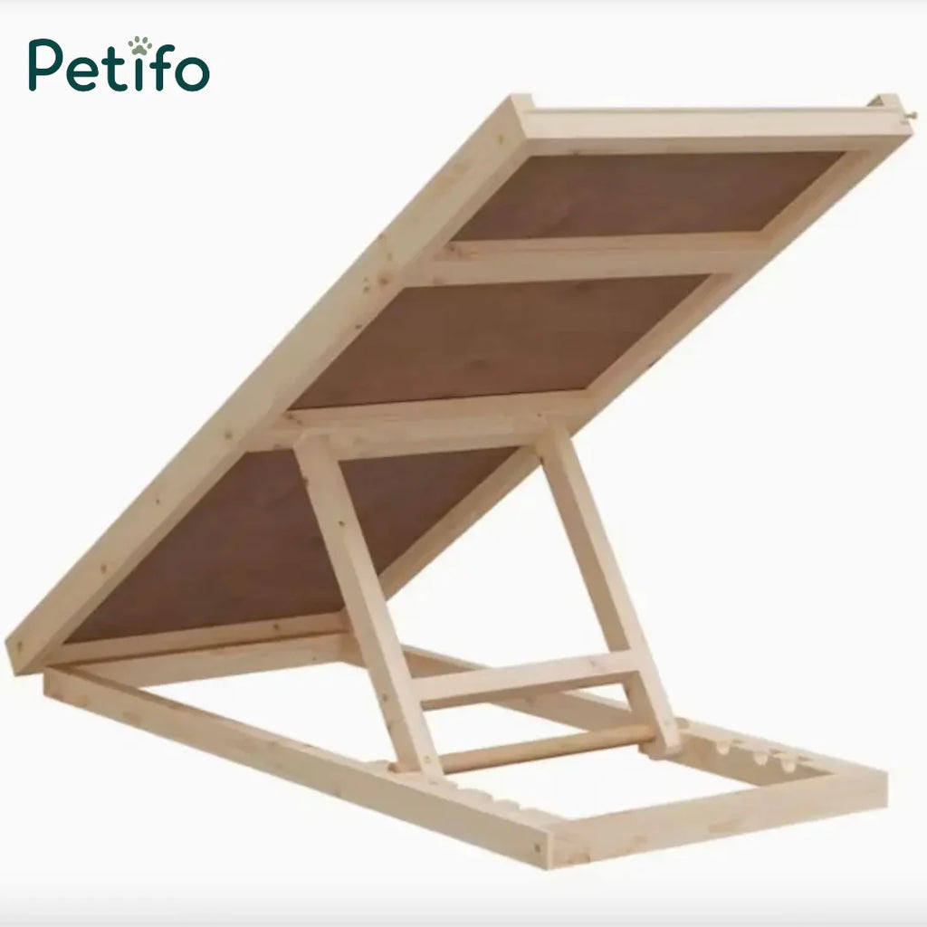 The underside view of an adjustable wooden pet ramp showing the sturdy support frame and mechanism for height customization.