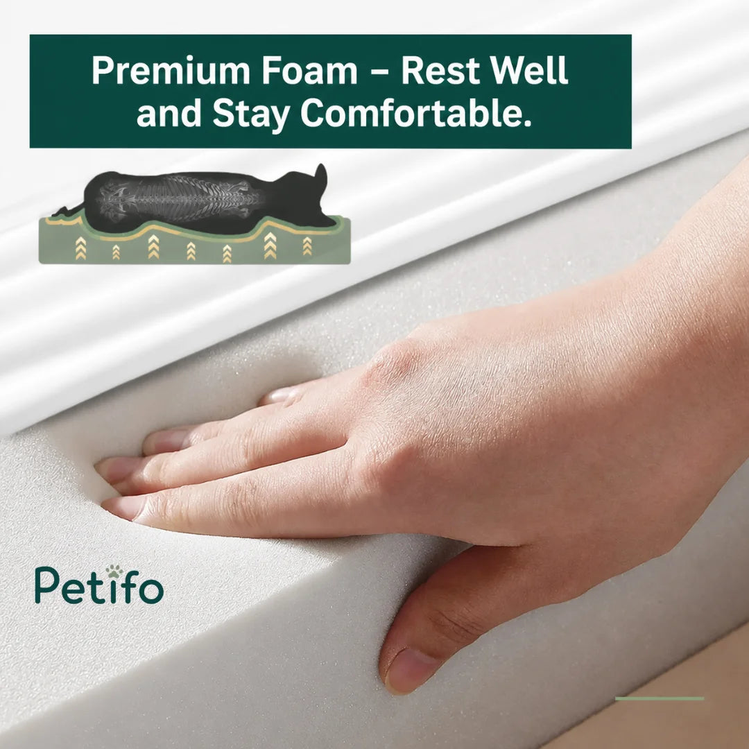 A hand pressing into the premium, supportive foam of a Petifo dog bed, highlighting its comfort.