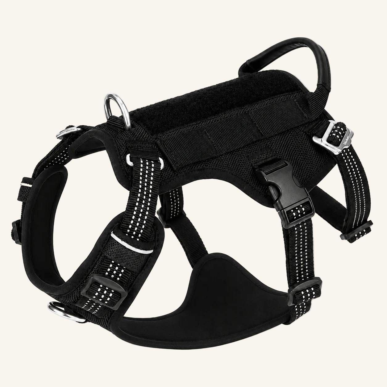 This black  tactical-style dog harness features reflective stitching, durable buckles, an integrated handle.