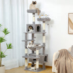 A tall, multi-level grey cat tower featuring multiple platforms, sisal-wrapped scratching posts, a central enclosed condo, and a hanging hammock.