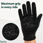 Textured patterned palm of a black equestrian riding glove designed for maximum grip.