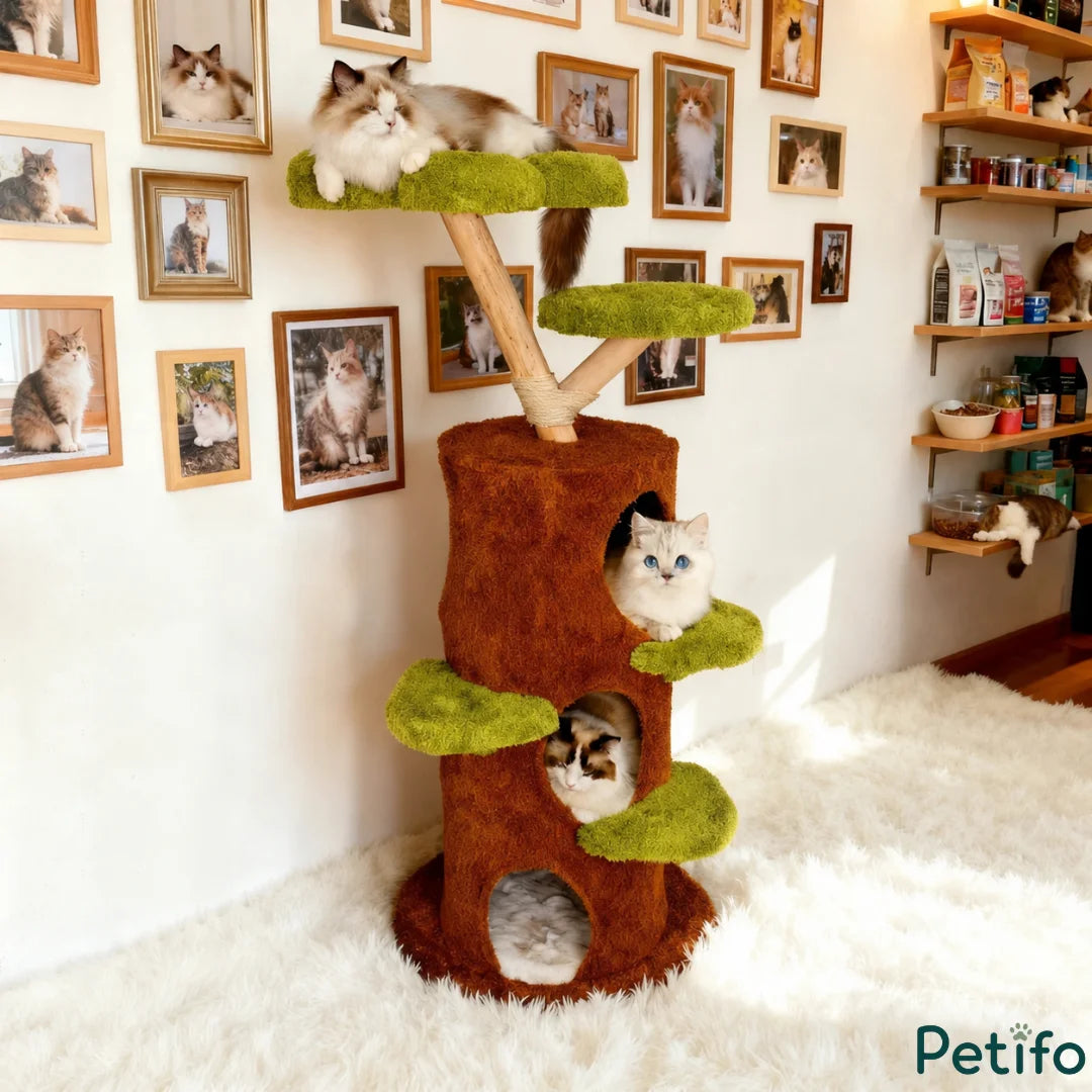 Three fluffy cats resting on a multi-level tree-shaped cat tower with plush green platforms and a brown climbing structure.