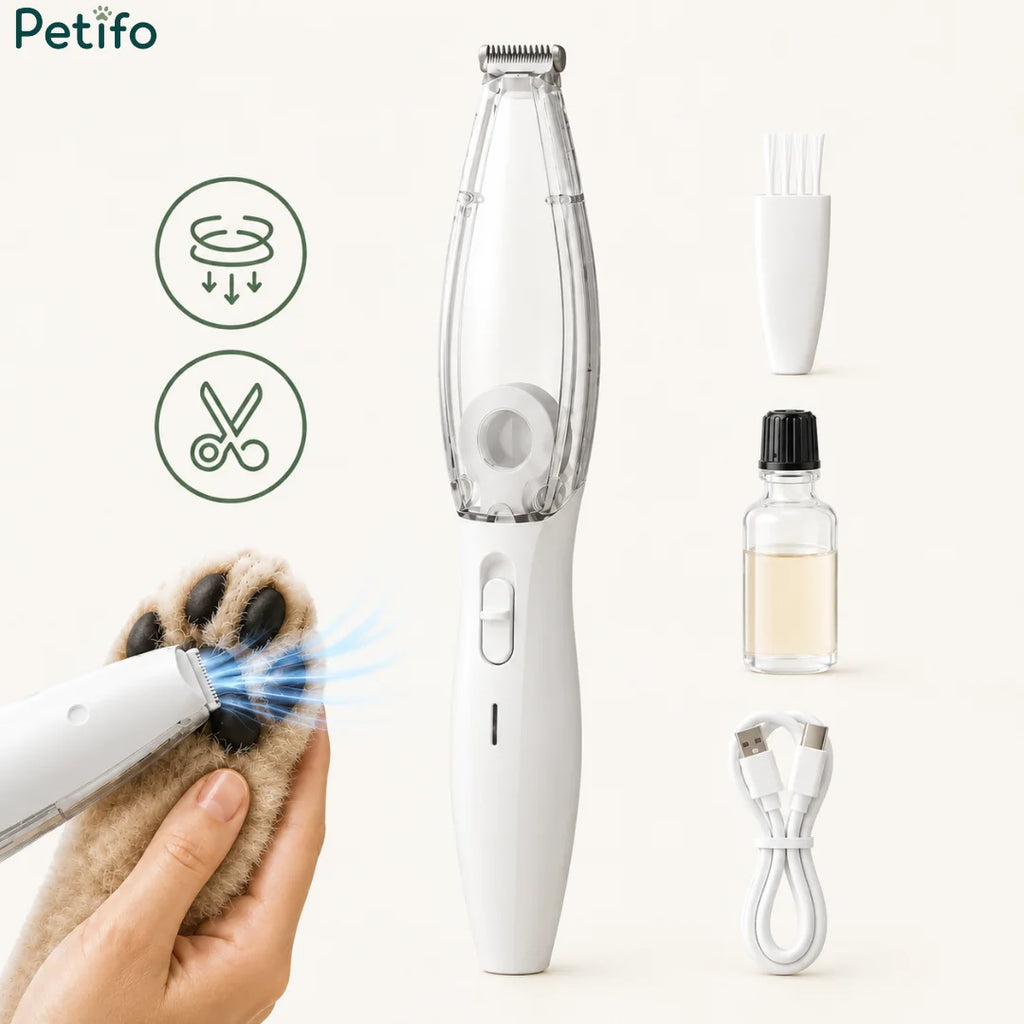 Complete kit display featuring the vacuum pet trimmer alongside a cleaning brush, oil bottle, and USB charging cable.