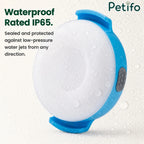 Waterproof IP65 rated Petifo LED dog safety light covered in water droplets.