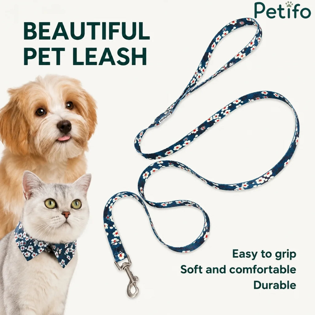 floral pet leash displayed next to a fluffy dog and a cat wearing a matching bow tie.