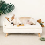 A premium white, plush pet sleeping sofa with wooden legs, designed for comfort and style.