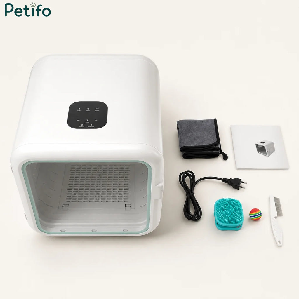White automatic pet drying box with an open glass door for easy access.