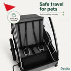 The interior of a pet bike trailer featuring built-in safety buckles and a high-visibility safety flag for secure travel.
