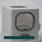 Cat using the Detixy covered litter tray with its pull-out base – Petifo
